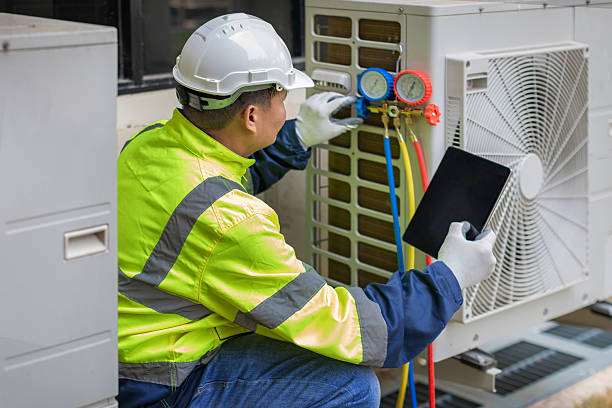 Professional Ductwork Repair technician working in Bellport, NY